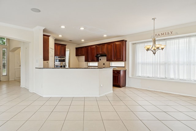 5723 Green Hollow Ln, The Colony, TX 75056 - kitchen featuring crown molding, a chandelier, recessed lighting, a peninsula, and under cabinet range hood