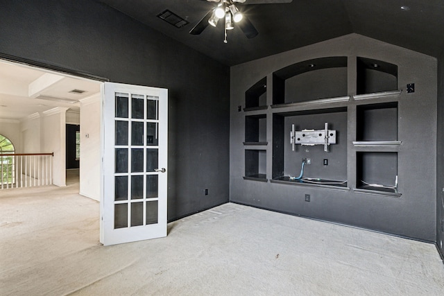 5723 Green Hollow Ln, The Colony, TX 75056 - empty room featuring carpet, ceiling fan, built in shelves, and high vaulted ceiling