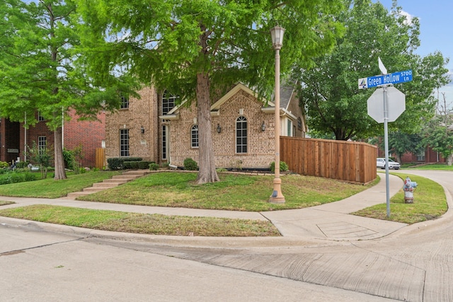 5723 Green Hollow Ln, The Colony, TX 75056 - view of front facade featuring brick siding