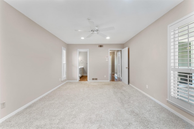 310 Northview Dr, Richardson, TX 75080 - unfurnished bedroom featuring baseboards, light carpet, recessed lighting, connected bathroom, and ceiling fan