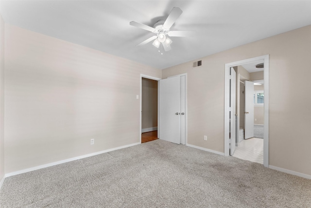 310 Northview Dr, Richardson, TX 75080 - unfurnished bedroom with light carpet, baseboards, and ceiling fan