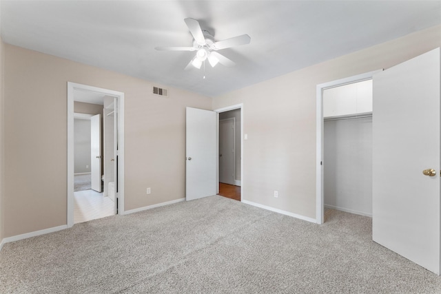 310 Northview Dr, Richardson, TX 75080 - unfurnished bedroom with light colored carpet, baseboards, a closet, and a spacious closet