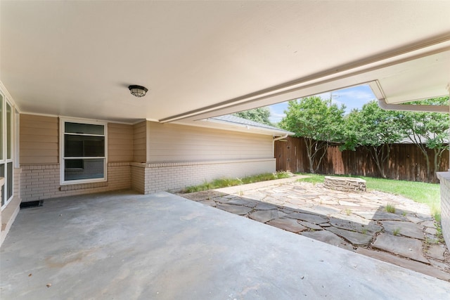 310 Northview Dr, Richardson, TX 75080 - fenced backyard with a patio and an outdoor fire pit