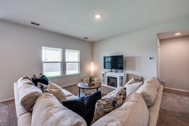 16421 Porterfield Ln, Justin, TX 76247 - living room with carpet flooring, baseboards, recessed lighting, and a glass covered fireplace