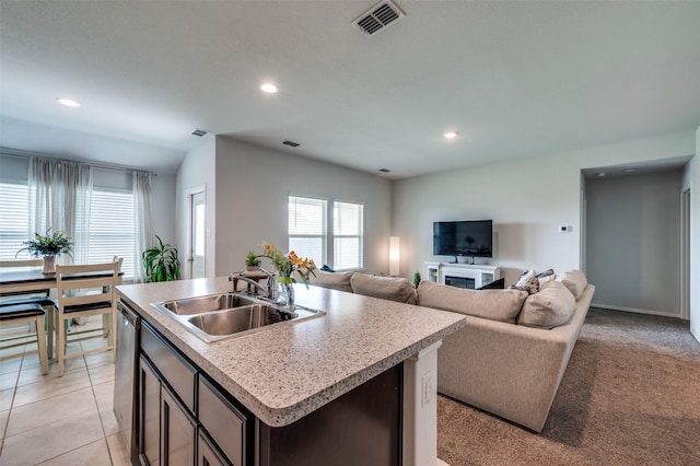 16421 Porterfield Ln, Justin, TX 76247 - kitchen featuring a sink, dishwasher, light countertops, recessed lighting, and an island with sink