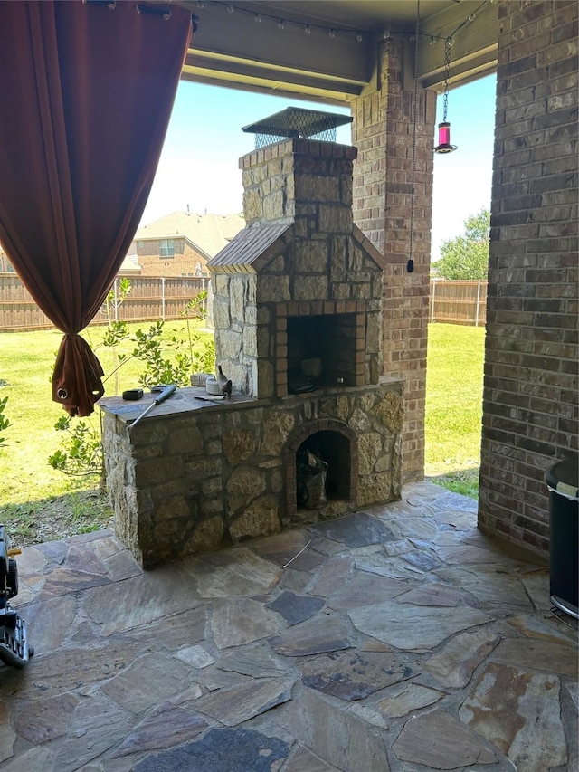 1102 Sunland Ct, Mansfield, TX 76063 - view of patio / terrace with an outdoor stone fireplace
