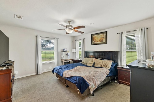 914 Glengarden St, Krum, TX 76249 - bedroom with light carpet, ceiling fan, and baseboards