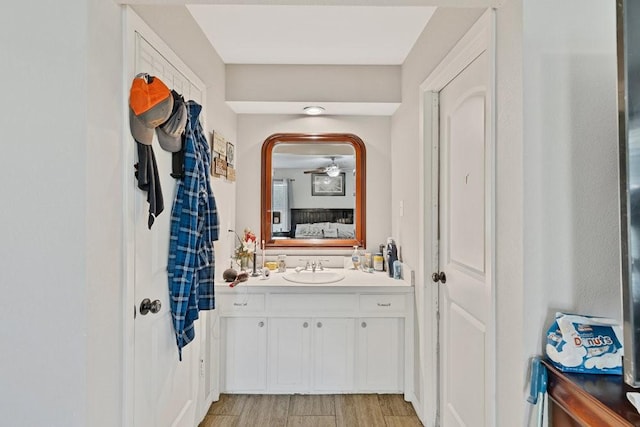 914 Glengarden St, Krum, TX 76249 - ensuite bathroom with wood finished floors and vanity
