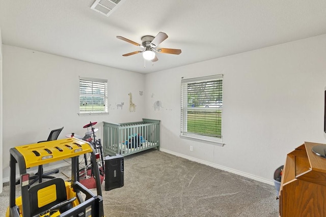 914 Glengarden St, Krum, TX 76249 - carpeted bedroom with multiple windows, baseboards, and a ceiling fan