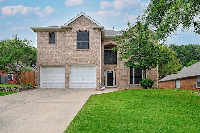 1503 Murphy Dr, Rockwall, TX 75087 - view of front of property featuring a garage, concrete driveway, and brick siding