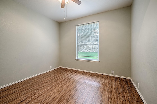 1503 Murphy Dr, Rockwall, TX 75087 - unfurnished room featuring wood finished floors, ceiling fan, and baseboards