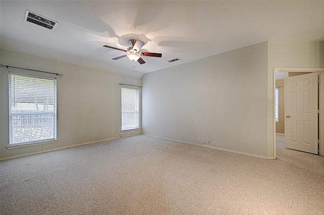 1503 Murphy Dr, Rockwall, TX 75087 - empty room featuring light colored carpet, ceiling fan, and baseboards