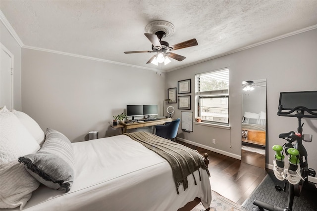 5010 Lahoma St, Dallas, TX 75235 - bedroom featuring dark wood-style flooring, ornamental molding, a textured ceiling, a ceiling fan, and baseboards