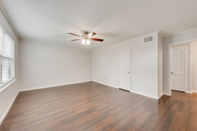 5010 Lahoma St, Dallas, TX 75235 - unfurnished bedroom featuring dark wood-type flooring, baseboards, ornamental molding, and a ceiling fan