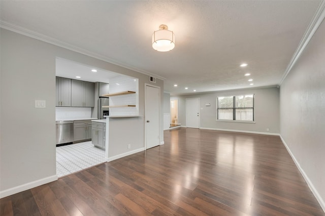 5010 Lahoma St, Dallas, TX 75235 - unfurnished living room featuring ornamental molding, wood finished floors, recessed lighting, and baseboards