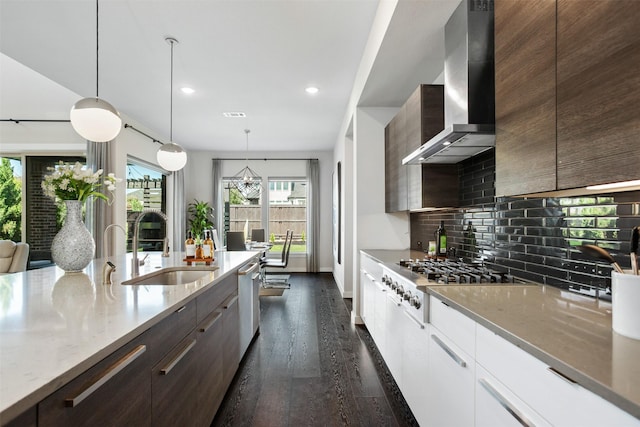 2468 Electra Dr, Allen, TX 75013 - kitchen featuring wall chimney exhaust hood, appliances with stainless steel finishes, modern cabinets, dark wood finished floors, and recessed lighting