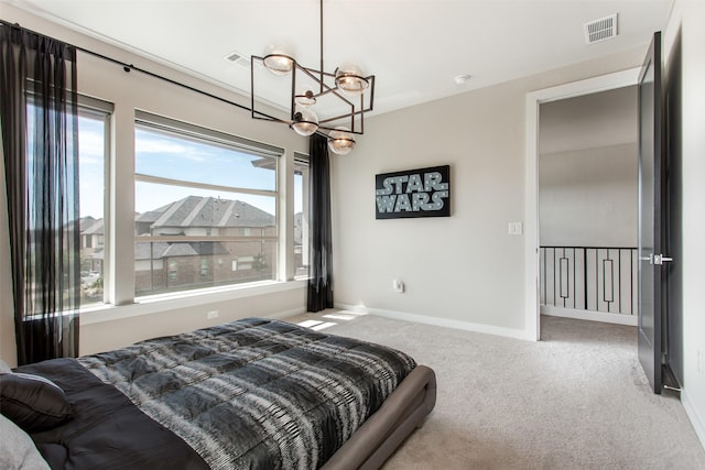 2468 Electra Dr, Allen, TX 75013 - carpeted bedroom with a chandelier and baseboards