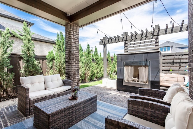 2468 Electra Dr, Allen, TX 75013 - fenced backyard featuring an outdoor living space with a fireplace and a patio