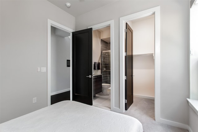 2468 Electra Dr, Allen, TX 75013 - carpeted bedroom with baseboards and ensuite bathroom
