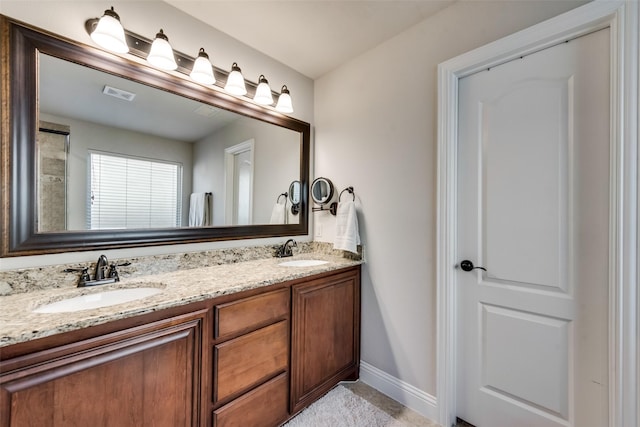1003 Stanbridge Dr, Wylie, TX 75098 - full bathroom featuring double vanity and baseboards