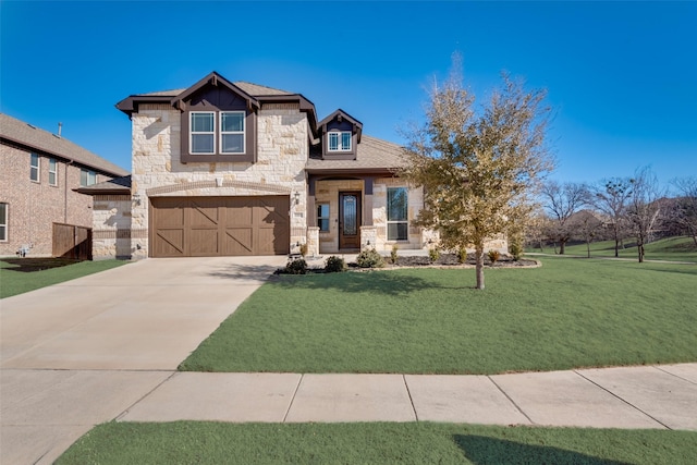 1003 Stanbridge Dr, Wylie, TX 75098 - view of front facade featuring stone siding, driveway, an attached garage, and a front lawn