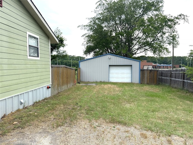 14051 Joe B Fulgham Cir, Brownsboro, TX 75756 - view of yard with a garage, an outbuilding, and driveway
