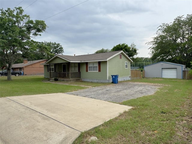 14051 Joe B Fulgham Cir, Brownsboro, TX 75756 - view of front of property featuring covered porch, driveway, an outbuilding, and a detached garage