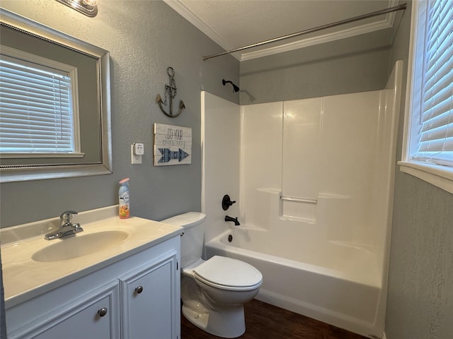 14051 Joe B Fulgham Cir, Brownsboro, TX 75756 - bathroom featuring ornamental molding, toilet, vanity, plenty of natural light, and shower / bath combination