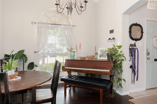 14221 Tijuana Trl, Fort Worth, TX 76052 - dining area featuring a chandelier, baseboards, and light wood-type flooring