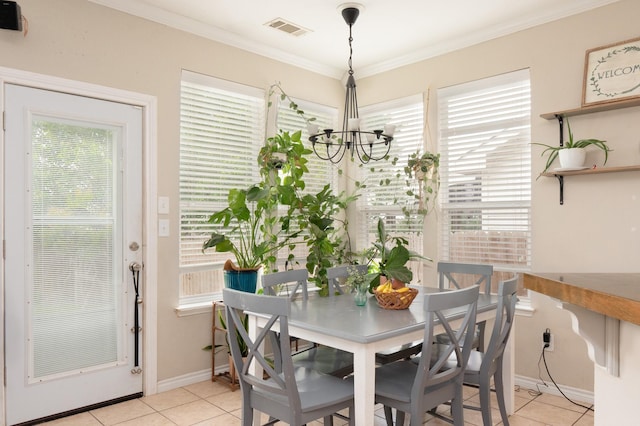 14221 Tijuana Trl, Fort Worth, TX 76052 - dining room with a chandelier, light tile patterned floors, crown molding, and baseboards