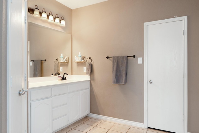 14221 Tijuana Trl, Fort Worth, TX 76052 - bathroom with tile patterned flooring, vanity, and baseboards
