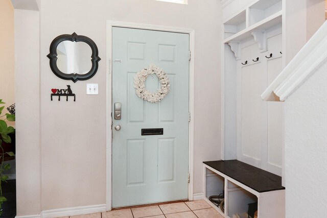 14221 Tijuana Trl, Fort Worth, TX 76052 - mudroom featuring light tile patterned floors and baseboards
