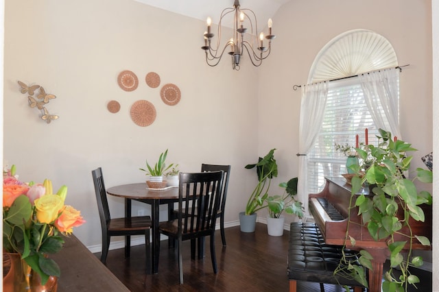 14221 Tijuana Trl, Fort Worth, TX 76052 - dining area featuring a chandelier, dark wood-style floors, and baseboards
