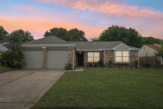 405 Rosemary Ln, Euless, TX 76039 - ranch-style house featuring an attached garage, concrete driveway, roof with shingles, a yard, and brick siding