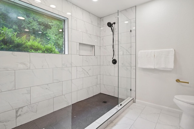 405 Rosemary Ln, Euless, TX 76039 - bathroom with a walk in shower, marble look tile flooring, toilet, and baseboards
