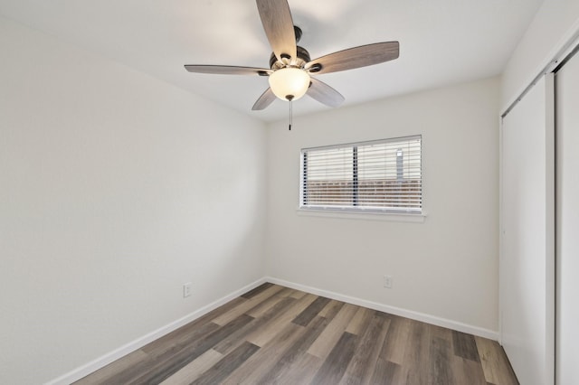 405 Rosemary Ln, Euless, TX 76039 - unfurnished bedroom featuring a closet, wood finished floors, baseboards, and a ceiling fan
