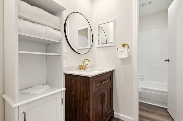 405 Rosemary Ln, Euless, TX 76039 - full bathroom with wood finished floors and vanity