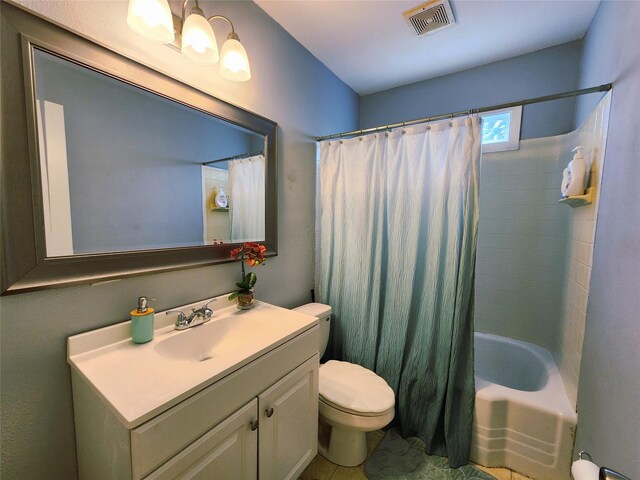 2908 Wilkinson Ave, Fort Worth, TX 76103 - bathroom featuring toilet, vanity, and shower / bathtub combination with curtain