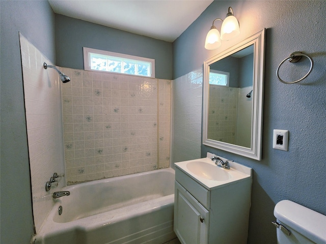 2908 Wilkinson Ave, Fort Worth, TX 76103 - full bathroom with toilet, bathtub / shower combination, and vanity