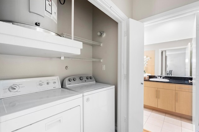 4605 Cedar Springs Rd Unit 339, Dallas, TX 75219 - laundry area with separate washer and dryer and light tile patterned flooring