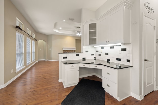 6345 Pinionpark Way, Fort Worth, TX 76179 - kitchen with dark countertops, decorative backsplash, white cabinetry, wood finished floors, and recessed lighting