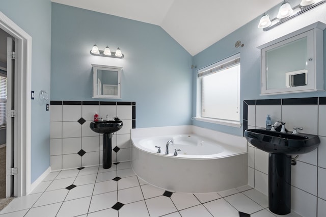 6345 Pinionpark Way, Fort Worth, TX 76179 - full bathroom with tile walls, a jetted tub, lofted ceiling, tile patterned flooring, and wainscoting