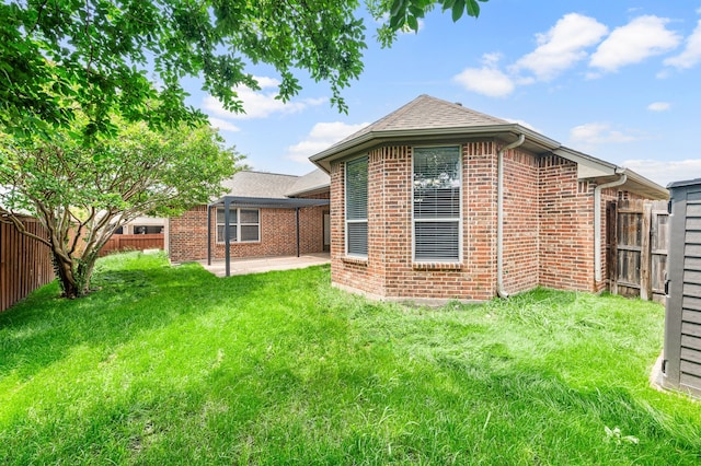 6345 Pinionpark Way, Fort Worth, TX 76179 - back of house featuring brick siding, a patio area, and a shingled roof