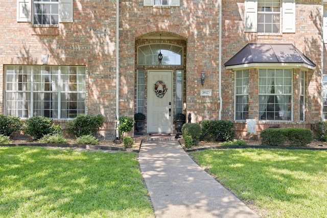 3625 Mackenzie Ln, Richardson, TX 75082 - entrance to property with a yard and brick siding