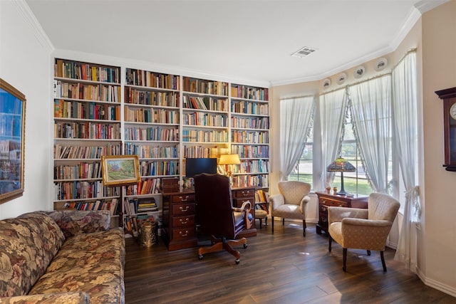 3625 Mackenzie Ln, Richardson, TX 75082 - sitting room featuring wall of books, ornamental molding, wood finished floors, and baseboards
