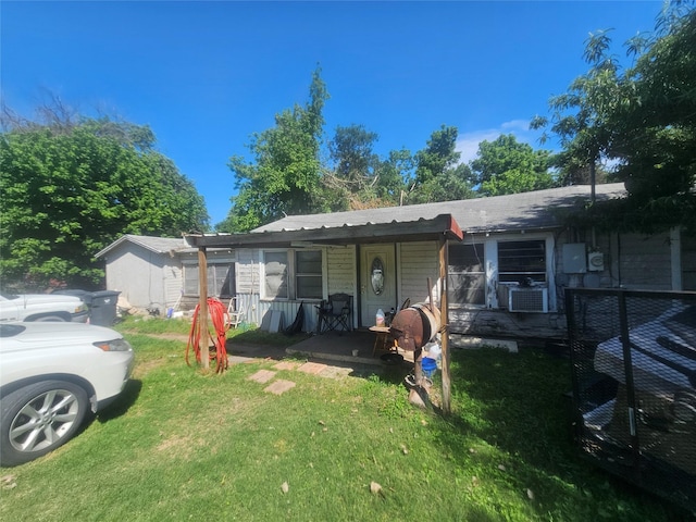 900 Garden Dr, Waco, TX 76706 - view of front of property with a front yard and cooling unit