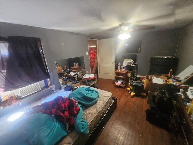900 Garden Dr, Waco, TX 76706 - bedroom with wood finished floors and a ceiling fan