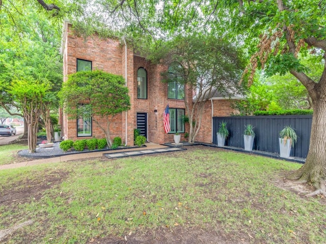 18004 Windflower Way, Dallas, TX 75252 - traditional-style home with brick siding