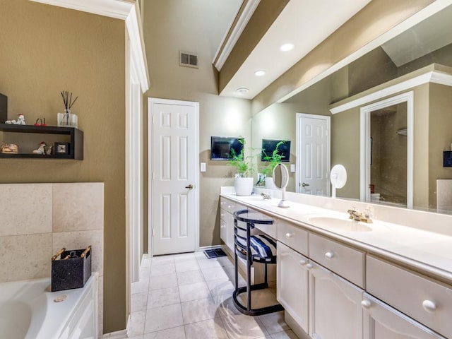 18004 Windflower Way, Dallas, TX 75252 - full bath featuring a garden tub, vanity, baseboards, recessed lighting, and tile patterned flooring