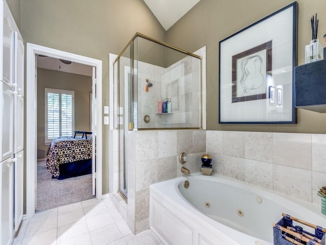 18004 Windflower Way, Dallas, TX 75252 - full bathroom featuring a shower stall, connected bathroom, tile patterned floors, a jetted tub, and vaulted ceiling